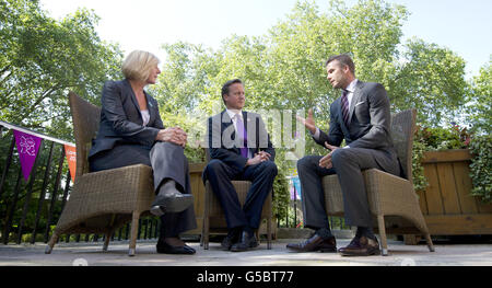 Prime Minister David Cameron, David Beckham and Anita Tiessen, the Deputy Executive Director of UNICEF UK, attend a UNICEF charity meeting in 10 Downing Street in London. Stock Photo