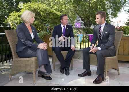 Prime Minister David Cameron, David Beckham and Anita Tiessen, the Deputy Executive Director of UNICEF UK, attend a UNICEF charity meeting in 10 Downing Street in London. Stock Photo