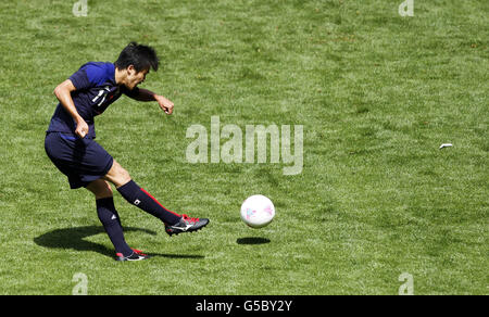 London Olympic Games - Day 8. Japan's Kensuke Nagai scores the opening goal against Egypt during the Olympic match at Old Trafford, Manchester. Stock Photo