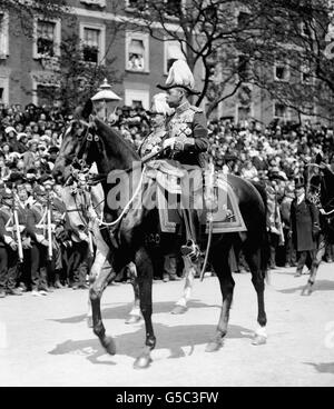 1910: King George V (nearest camera) and Kaiser Wilhelm II of Germany ride in the funeral procession of King Edward VII. Stock Photo