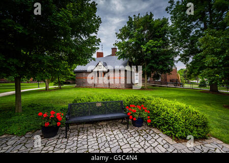 Bench and buildings on the campus of Gettysburg College, in Gettysburg, Pennsylvania. Stock Photo