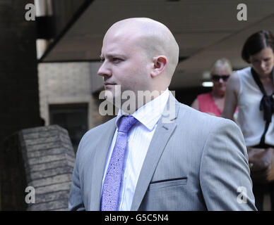 British Transport Police officer Pc David Lynch, 31, of Comfrey Road, Stotfold, Hitchin, Hertfordshire, who hit cyclist Joseph Belmonte, leaving him seriously injured, whilst driving a marked police van, leaves Southwark Crown Court, after jurors were told that he was driving the police vehicle at speeds of up to 68mph in a 30mph zone as it approached a hump-backed bridge in Hackney, east London. Stock Photo