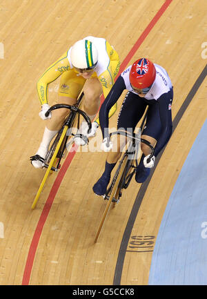 Great Britain's Victoria Pendleton (right) races with Australia's Anna Meares in the Women's Sprint Final Race 1 in the Velodrome at the Olympic Park, on the eleventh day of the London 2012 Olympics. Stock Photo