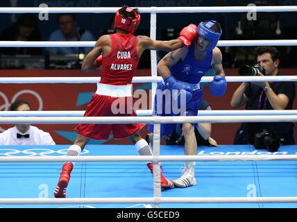 Ireland's John Joe Nevin (blue) during his Bronze Medal bout with Cuba's Lazaro Alvarez Estrada in their Men's Boxing Bantam-Weight 56kg fight at the Excel Arena, London. Stock Photo