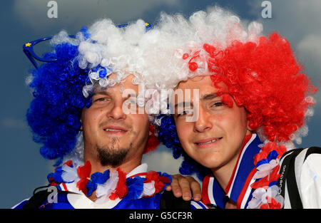 France supporters enjoy the atmosphere in the Olympic Park during day fourteen of the London 2012 Olympic Games. Stock Photo