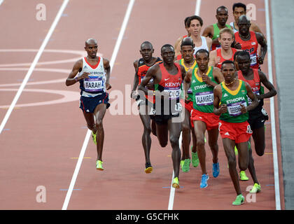 Great Britain's Mo Farah on his way to winning the Men's 5000m final on day fifteen of the London Olympic Games in the Olympic Stadium, London. Stock Photo