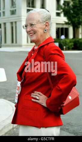 Queen Margrethe II of Denmark walks through the Olympic athletes village during a short tour of the site in Stratford, east London. Stock Photo