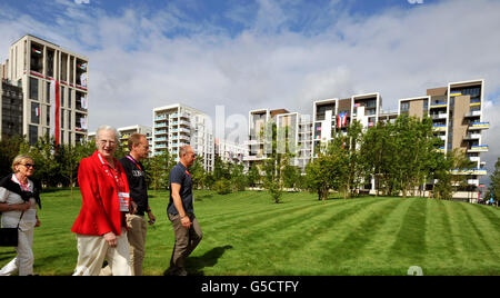 Queen Margrethe II of Denmark walks through the Olympic athletes village during a short tour of the site in Stratford, east London. Stock Photo