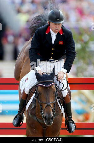 Great Britain's Nick Skelton Big Star during the Individual Jumping Final Round A at Greenwich Park, on the twelfth day of the London 2012 Olympics. Stock Photo