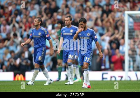 Chelsea's Eden Hazard (right) dejected after Manchester City score