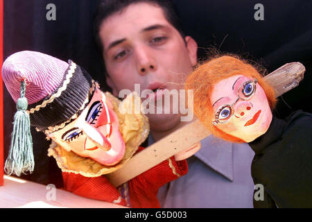 Magician and entertainer Michael J Fitch, from Marks Tey, near Colchester, Essex, who has had a puppet made of BBC quiz show host Anne Robinson (right) for his Punch And Judy show to replace the traditional ghost as the villainous puppet. Stock Photo