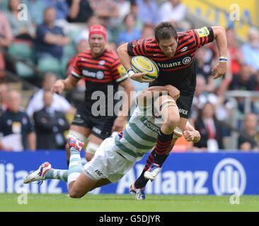 Rugby Union - Aviva Premiership - Saracens v London Irish - Twickenham. Saracens' Ernst Joubert tackled by London Irish's Steve Shingler during the Aviva Premiership match at Twickenham, London. Stock Photo