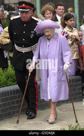 The Queen Mother meets well wishers, as she officially reopens the Tower Hamlets Memorial Garden, London, this afternoon. The site was the scene of many wartime visits by the 100 year old royal and her husband, King George during the Second World War. * The new gardens are part of a 33 million regeneration project for the area. Stock Photo