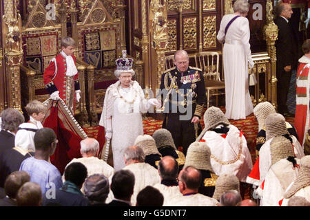 Queen Elizabeth II and the Duke of Edinburgh leave the House of Lords after reading the Queen's Speech for State Opening of Parliament, in Westminster, in London. The Speech outlines the new Labour government's legislative programme. Stock Photo