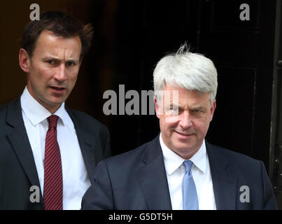 NOTE ALTERNATE CROP. Health secretary Jeremy Hunt (left) and Leader of the Commons Andrew Lansley leave a cabinet meeting at Downing Street in London, after Prime Minister David Cameron hailed his new-look top team, insisting he had put the right people in place to kick start the flagging economy. Stock Photo