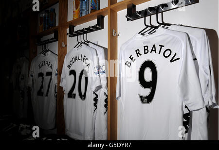 Soccer - Barclays Premier League - Fulham v West Bromwich Albion - Craven Cottage. General view of the Fulham dressing room showing the shirts of Sascha Riether, Hugo Rodallega and Dimitar Berbatov Stock Photo