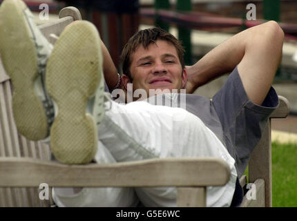 NO COMMERCIAL USE : Great Britain's Barry Cowan relaxes, the morning after his defeat to USA's Pete Sampras in the Second Round of the 2001 Lawn Tennis Championships at Wimbledon, London. Stock Photo