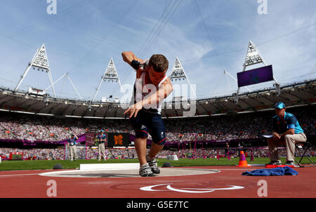 Great Britain's Kyron Duke during the Men's Shot Put F40 category in the Olympic Stadium. Stock Photo