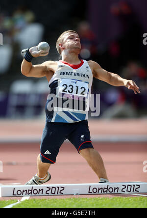 Great Britain's Kyron Duke during the Men's Shot Put F40 category in the Olympic Stadium. Stock Photo