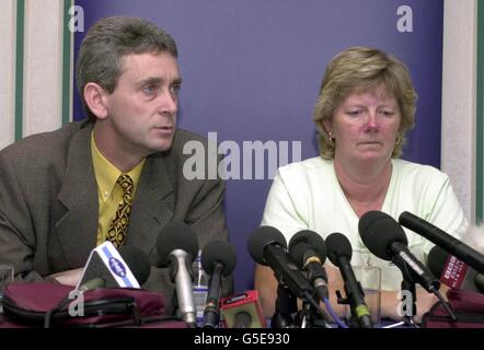 Detective Superintendent Peter Coltman with Linda Jones, the mother of missing Danielle Jones, as she makes an emotional plea for any help in finding the 15 year old, at Grays Police station. * The teenager has been missing from her Grays, Essex home since the morning of 18th June, and police are desperate for clues to her whereabouts. Stock Photo