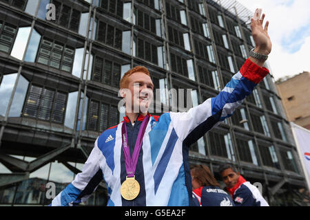 British Olympic gold medal winning athlete Greg Rutherford takes part in the Olympics & Paralympics Team GB victory Parade in London. Stock Photo