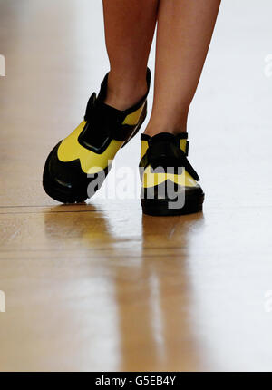 A model wearing shoes designed by Madonna's brother, Christopher Ciccone, on the Catwalk during the Nico Didonna Spring/Summer 2013 show at the Italian Cultural Institute, London, for London Fashion Week. Stock Photo