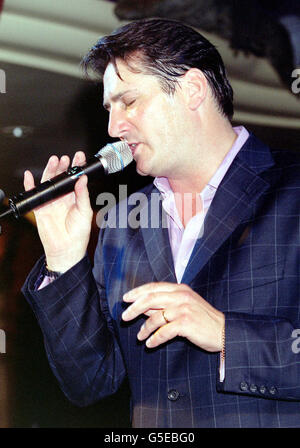 Former Spandau Ballet lead singer Tony Hadley performs during a fundraising event in aid of Cancer & Leukeamia in Childhood at Planet Hollywood in London. Stock Photo