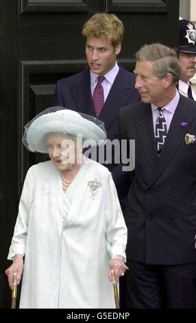 Queen Elizabeth The Queen Mother with her grandson the Prince of Wales, and his son Prince William (C) outside Clarence House. The Royal family were at her London residence to celebrate her 101st birthday. Stock Photo