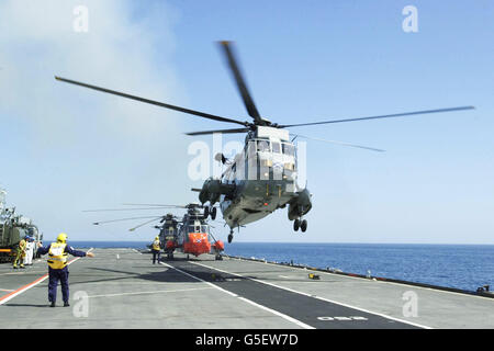 Britain's, Duke of York, 41, leaves in a Sea King helicopter from the deck of The Ark Royal a Naval ship, off Newcastle upon Tyne, for the final time as a serving Officer. * Andrew joined the Royal Navy in 1979 and saw active service with the rank of Sub Lieutenant as part of the British naval task force which sailed to the South Atlantic in 1982 to regain the Falkland Islands from Argentina. Stock Photo