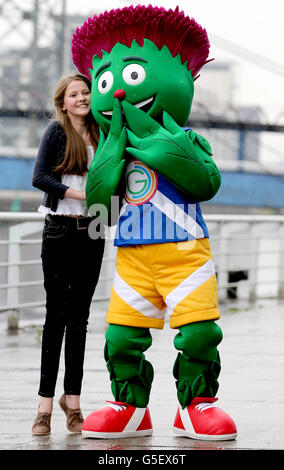 The Glasgow Commonwealth Games 2014 mascot Clyde is unveiled at a ceremony on the banks of the River Clyde. It is pictured with mascot designer 12 year old Beth Gilmour from Cumbernauld, the winning design was chosen from around 4,000 entries. Stock Photo