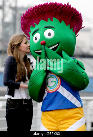 The Glasgow Commonwealth Games 2014 mascot Clyde is unveiled at a ceremony on the banks of the River Clyde. It is pictured with mascot designer 12 year old Beth Gilmour from Cumbernauld, the winning design was chosen from around 4,000 entries. Stock Photo