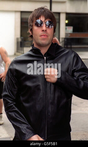 Oasis front man Liam Gallagher leaving the exclusive Portland Hospital, London, after former All Saint Nicole Appleton gave birth to their first baby. She reportedly said, 'It was easier than having a tattoo.' Stock Photo