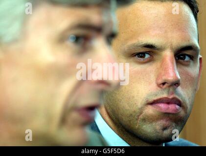 Arsenal's new goalkeeper Richard Wright poses for photographs at a press conference at their training ground in London Colney. Stock Photo