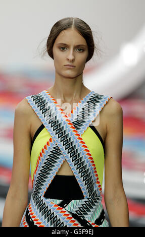 A model on the catwalk during the Peter Pilotto fashion show in the Top Shop Show Space, London, as part of London Fashion Week. Stock Photo