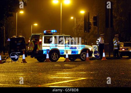 Police cordon off Uxbridge road in Ealing, west London following a suspected car bomb explosion near Ealing Broadway station in west London. Stock Photo