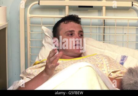 Richard Seaman, 24, speaking from his Ealing General Hospital bed, after being injured in last night's car bomb attack, in west London. * Seven people were injured when the bomb - 88lb of explosives packed into a Saab saloon car - went off at midnight at Ealing Broadway as the streets were busy with people heading home. Stock Photo