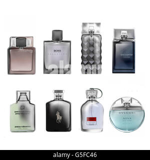 Grouping of various branded fragrance bottles for men, showcasing a selection of luxury perfumes and colognes used in grooming and personal care Stock Photo