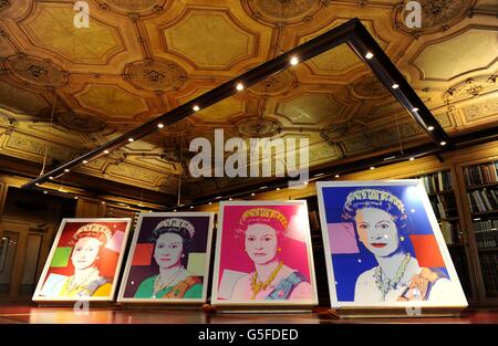 Andy Warhol's Reigning Queens: Queen Elizabeth II portraits on show in the Lower Library at Windsor Castle, after being acquired by the Royal Collection. Stock Photo