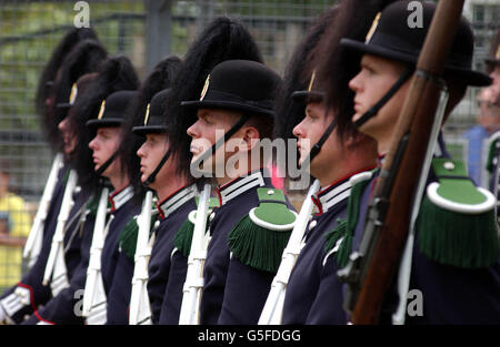 Members of The Royal Norwegian Guard on parade at Edinburgh Zoo in honour of King Penguin Nils Olav. *... The two-year-old arctic bird paraded his badge of office of Honoray Regimental Sergeant Major in front of the guards after retired Major Nils Egelien had presented the medal on behalf of King Harald of Norway at a ceremony held at the zoo. Stock Photo