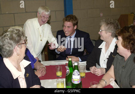 Prince William, the older son of Prince Charles, jokes with Alice Bell during a visitto the Sighthill Community Centre in Glasgow. The two princes were visiting various parts of Scotland on a one day tour. * Prince William is to start at St Andrews University on a four year History of Art degree. Stock Photo
