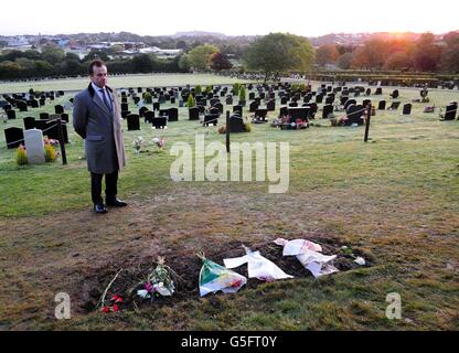 Funeral director Robert Morphet stands next to the grave of Sir Jimmy Savile in Woodlands Cemetery, Scarborough, where he assisted the local council in removing the headstone at the request of Savile's family. Stock Photo