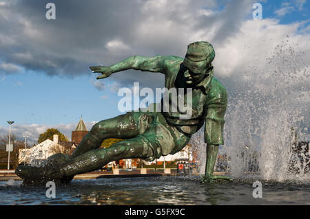 Soccer - npower Football League One - Preston North End v Milton Keynes Dons - Deepdale. A statue of Preston North End's Tom Finney splashing through a puddle Stock Photo