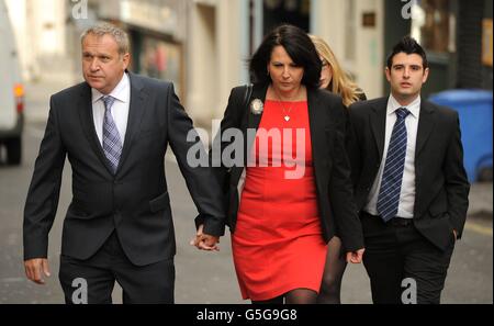 Elaine O'Callaghan mother of Sian O'Callaghan arrives with partner Pete Shawe (left) at Bristol Crown Court. Stock Photo