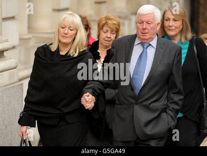 Karen Edwards (left) and Charlie Edwards, mother and step-father of Becky Godden-Edwards arrive at Bristol Crown Court. Stock Photo