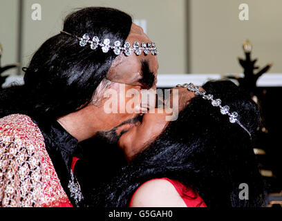 REISSUED AMENDING TOPIC Jossie Sockertopp, 23 (right) and Sonnie Gustavsson, 29, from Sweden tie the knot in full Klingon costume as their Star Trek idols, during a ceremony conducted by Peter Wyllie in the Klingon language, at Destination Star Trek at the ExCel Centre in London. Stock Photo