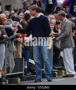 Prince William shakes hands with a well-wisher as crowds gathered to witness the Prince arriving at St. Andrews University, St. Andrews, Scotland, where he is to study an art history degree. He was accompanied by his father Prince Charles, The Duke of Rothesay. Stock Photo