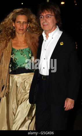 Former Rolling Stone Bill Wyman and wife Suzannah arriving for the Royal premiere of the film Enigma in London's Leicester Square. Actress Kate Winslet pulled out of the premiere after announcing she was taking time 'out of the spotlight'. * She was due to attend the event in London with fellow stars of the romantic Second World War tale, which would have been her first public appearance since parting from husband Jim Threapleton. The Prince of Wales met the cast and crew at tonight's event. 24/10/01 Bill Wyman who became the first great British rocker to qualify for a pension and a Stock Photo