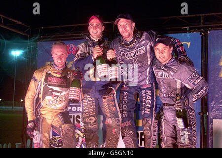 Sheffield spedway at Owlerton stadium. Jasin Crump of the Kings Lynn Knights celebrates his win with team mate Nicki Pedersen (R) who finished 3rd and Scott Nicholls (L) who finished 2nd and Mikael Karlsson (1st Left). Stock Photo