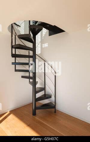 Interior, spiral staircase of a modern loft Stock Photo