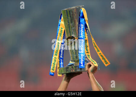 Rugby League - Stobart Super League - Grand Final - Warrington Wolves v Leeds Rhinos - Old Trafford. Leeds Rhinos players lift the grand final trophy Stock Photo